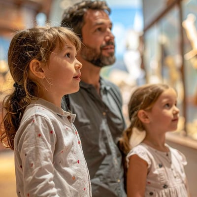 Close-up of a bilingual children’s museum exhibit sign, showing a creative translation of playful content. Close-up of a bilingual children’s museum exhibit sign, showing a creative translation of playful content.